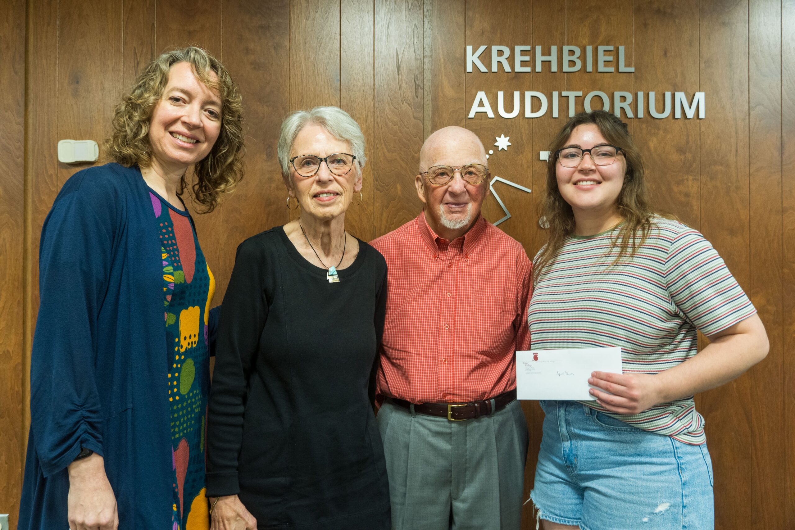 From left, Rachel Epp Buller, Vivian Leupp, Ron Leupp and April Powls, just outside Krehbiel Auditorium