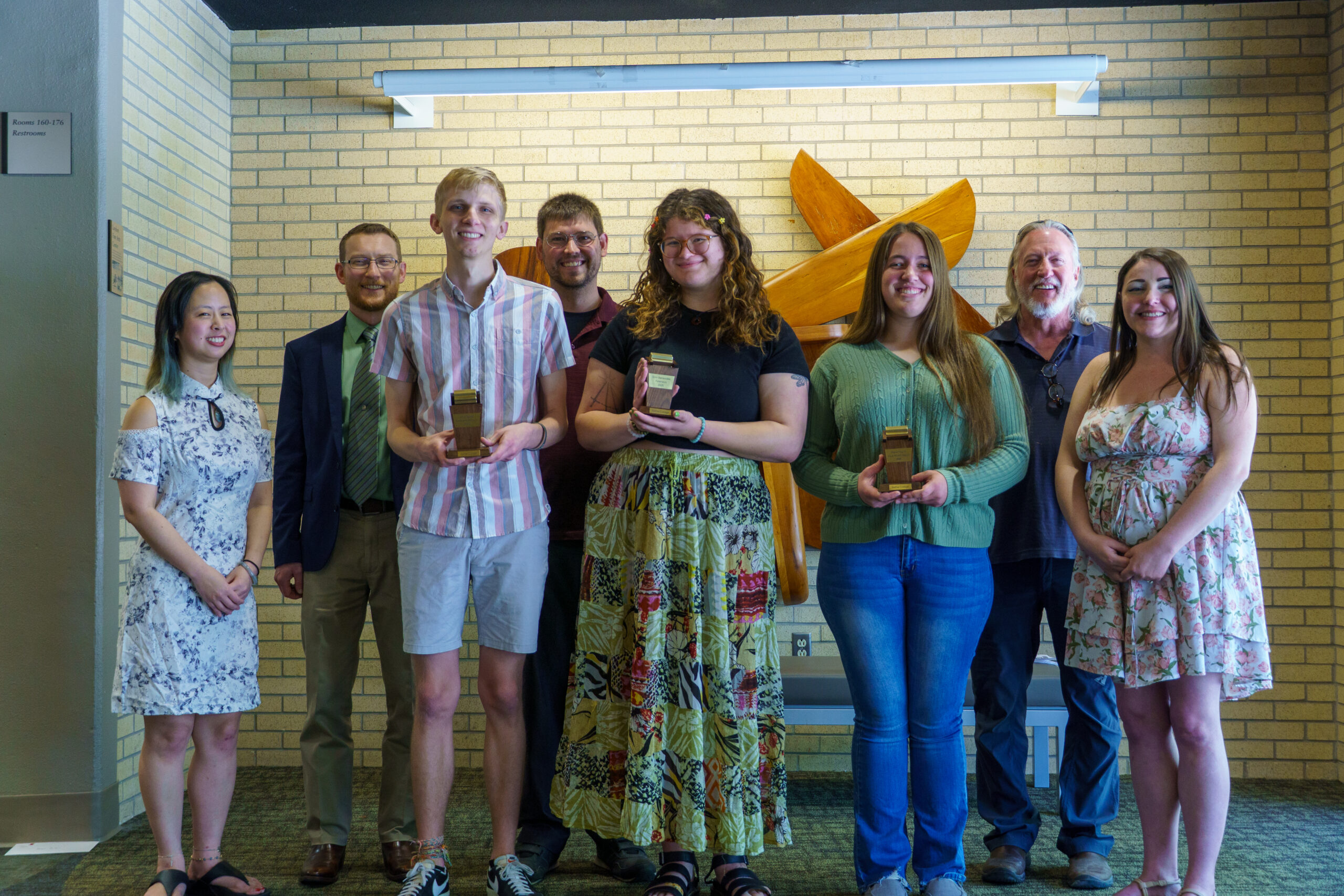 Thresher Awards: In front, from left, Peter Buller, Emil Benavides, Gracie Higgins. Faculty from left, Dr. Christina Liu, Peter Goerzen, Dr. Trent Voth, David Long, Dr. Cristy Dougherty