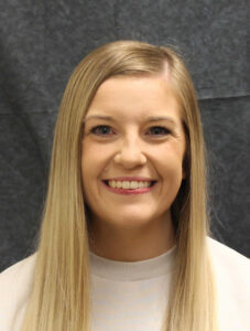 New coach brings broad Kansas collegiate experience