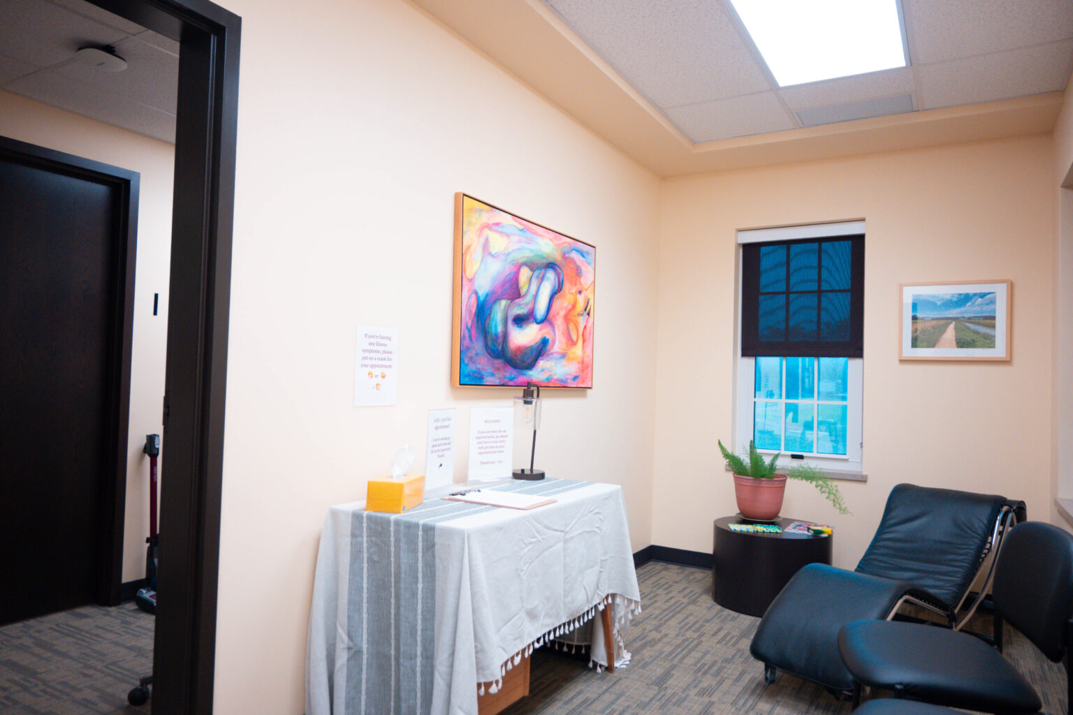 the Counseling Center lobby with intake forms and waiting room chairs